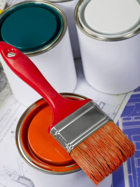 istock Paint brush and paint cans 1302539660