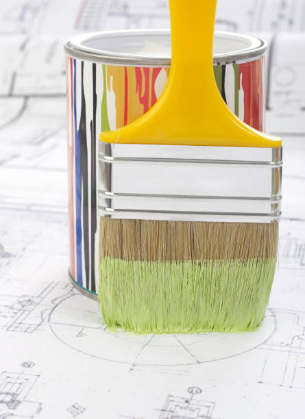 istock Paintbrush, paint can and blueprint 1302539680