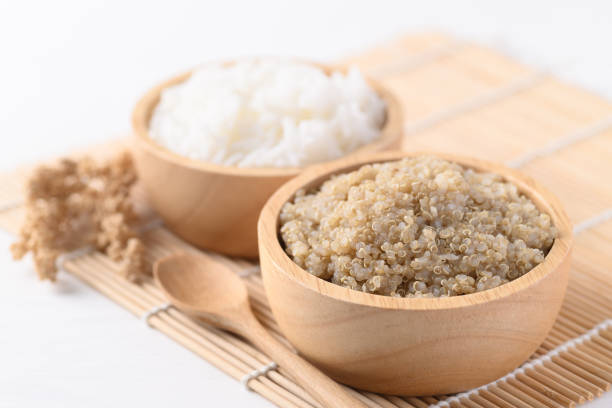 istock Cooked brown quinoa seeds and rice 1302540117