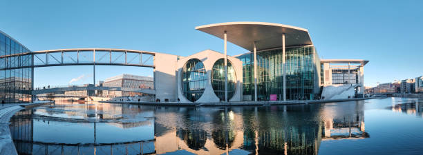 Pier Paul-Loebe-Haus Reichstag. Panoramic winter view. Paul-Loebe-Haus connected by bridge with Marie-Elisabeth-Lueders-Haus over Spree river Berlin, Germany - February 14, 2021: Pier Paul-Loebe-Haus Reichstag. Panoramic winter view. Paul-Loebe-Haus connected by bridge with Marie-Elisabeth-Lueders-Haus over Spree river. spree river stock pictures, royalty-free photos & images