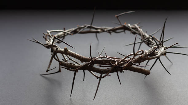 istock Crown of thorns on black 1302543849