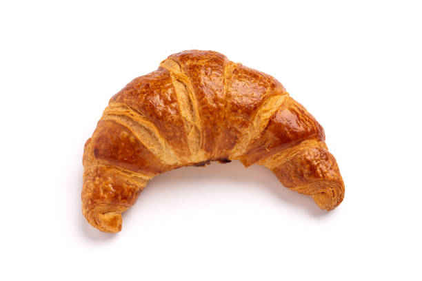 istock Delicious fresh croissant isolated on white background 1302547363
