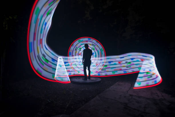 istock People with beautiful light painting artwork 1302548324