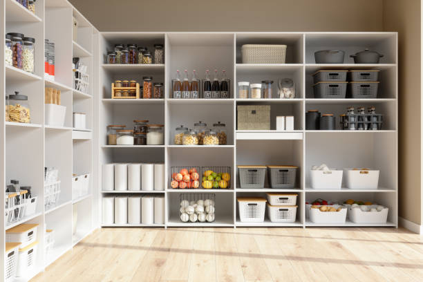 Organised Pantry Items In Storage Room With Nonperishable Food Staples, Preserved Foods, Healty Eatings, Fruits And Vegetables. stock photo