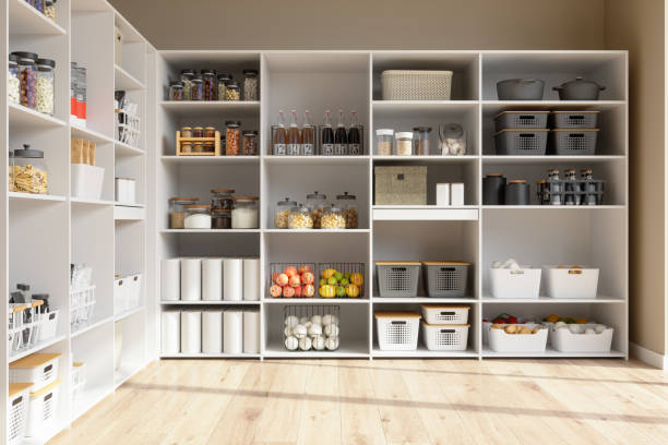 Organised Pantry Items In Storage Room With Nonperishable Food Staples, Preserved Foods, Healty Eatings, Fruits And Vegetables. Organised Pantry Items In Storage Room With Nonperishable Food Staples, Preserved Foods, Healty Eatings, Fruits And Vegetables. arranging stock pictures, royalty-free photos & images