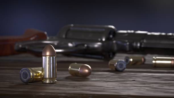 istock gun bullets close-up on old planks ground 3D rendered image 1302555800