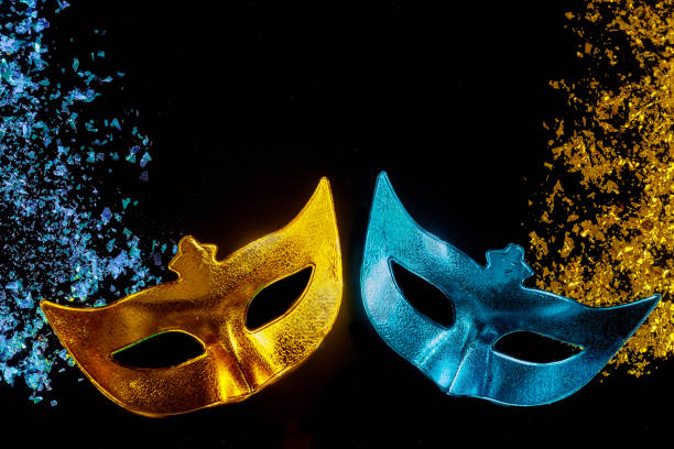 istock Carnival masks on black background. Jewish Purim. 1302557692