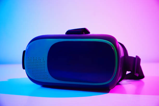 istock Virtual reality glasses on colorful background. Future technology, VR concept 1302558659