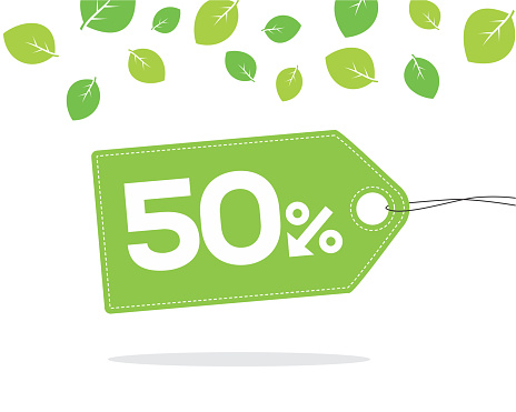 Green price tag label with 50% text designed with an arrow percent icon and stitches on it on white background with leaves and shadow. For spring and summer sale campaigns.