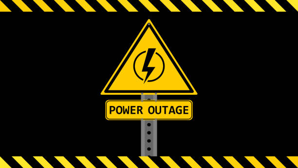 Power outage sign on a black background with yellow black stripes Power outage sign on a black background with yellow black stripes. Yellow black banner. Yellow warning sign. Yellow power outage placard. Electricity, power outage, short circuit, high voltage, danger concepts. glitch generator stock illustrations