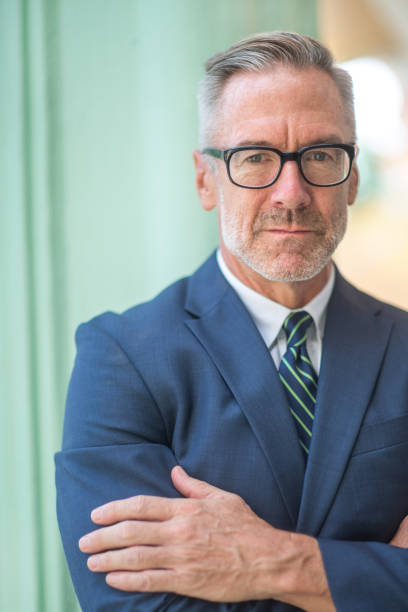 istock Handsome mature businessman at work 1302567175