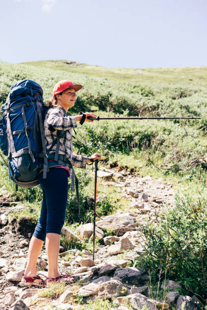 istock Young woman hiking 1302568030