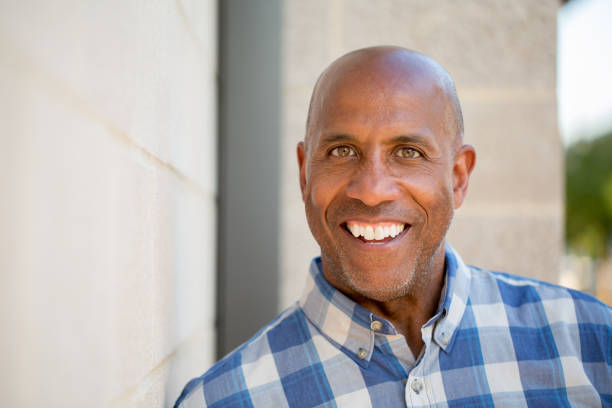 istock Happy mature African American man smiling 1302569198