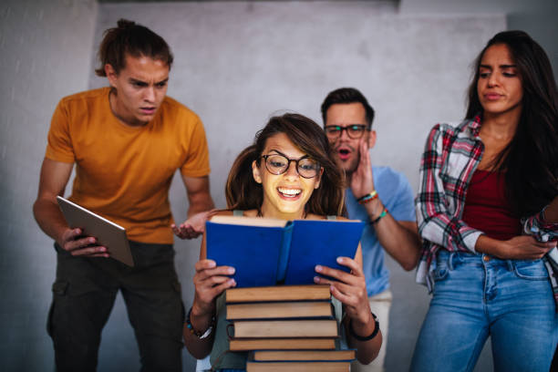 istock Ready to study hard. Happy nerd woman in library. Book lover. 1302570475