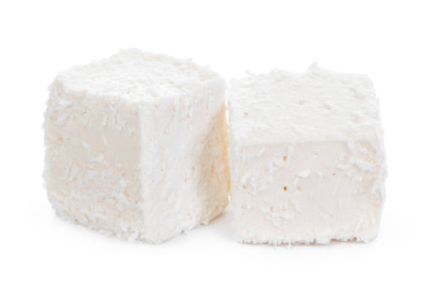 istock White Turkish delight with coconut shavings isolated on white 1302573295