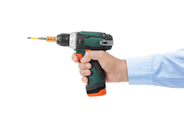 istock Electric drill or screwdriver in hand 1302574113