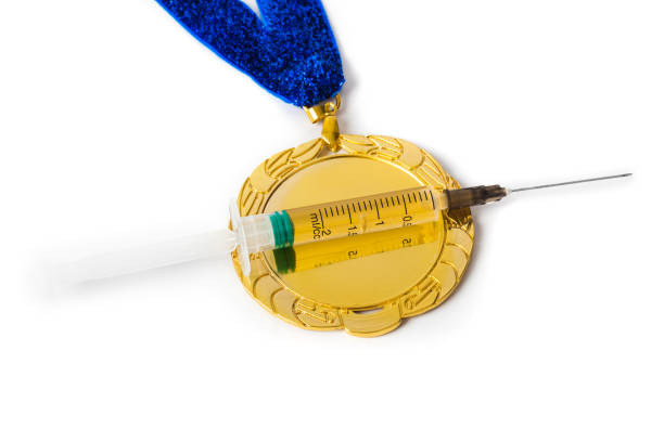 Gold medal and syringe