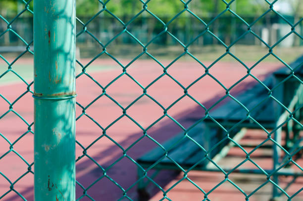 istock Wire Net Beside Sports Field. 1302574357