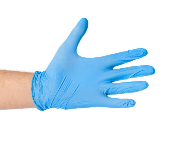 istock Hand in blue medical glove 1302574510