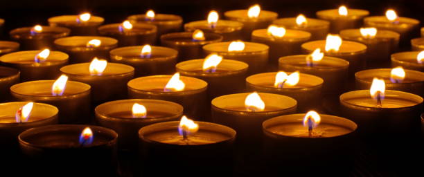 istock memory of the dead burning candles in the dark 1302575881