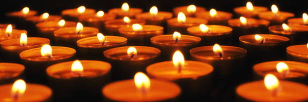 istock memory of the dead burning candles in the dark 1302576009