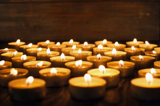 istock memory of the dead burning candles in the dark 1302576077