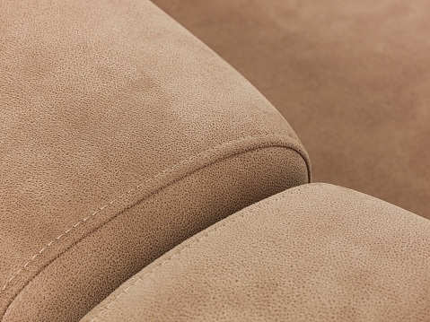 Artistic leather shape. Golden brown leather texture.