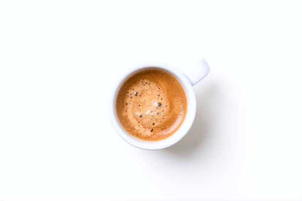istock Cup of coffee on bright  background. Top view. 1302577786