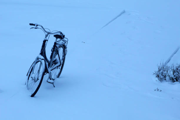 istock Bike in the snow 1302578972