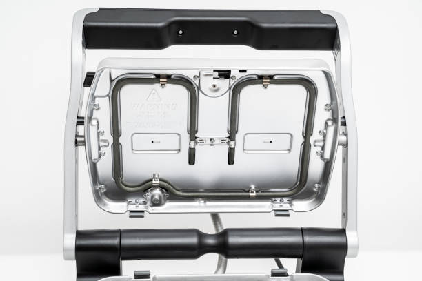 istock electric grill with open lid. the panels were removed 1302579160