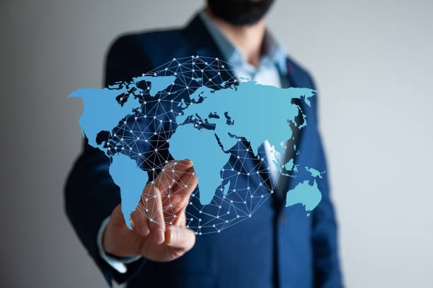 istock Business man touching world map screen 1302579279