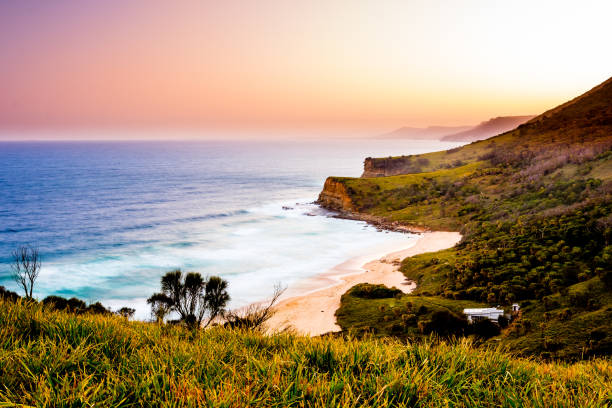 istock Sunset Scape of Burning Palms Beach 1302579998