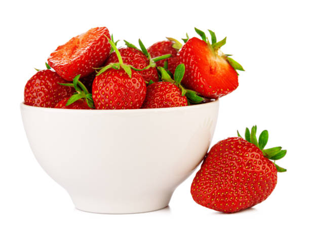 istock bowl with strawberries isolated on white background 1302580270