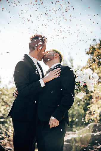 gay couple kissing for the marriage