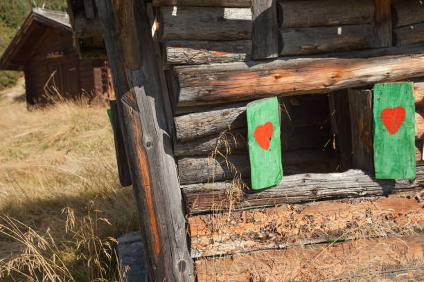 hearth shape over a wooden balcony in a small alpine cabine