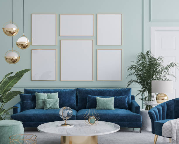 istock Frame mockup in home interior with blue sofa, marble table and tiffany blue wall decor in living room 1302586626