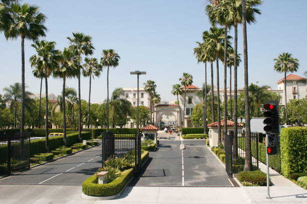 Paramount Pictures studio LOS ANGELES, CALIFORNIA - May 3, 2008: Paramount Pictures studio entrance with fountain. Paramount Pictures is a motion picture studio in California. paramount studios stock pictures, royalty-free photos & images