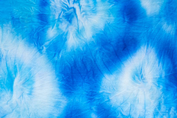 istock Blue and white abstract hand painted tie dye texture 1302589344
