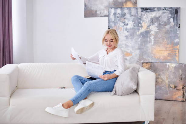 istock Young female working at home 1302590787