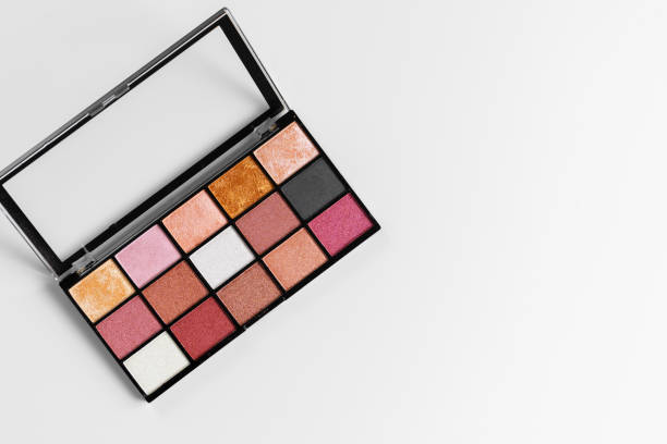istock Make up colorful eyeshadow palettes on white 1302593994