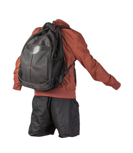 istock backpack, shorts, summer jacket isolated on white background. 1302595793
