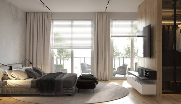 istock Minimalism modern interior design bedroom with panoramic windows. Contemporary bed with bedside tables and bedside bench. Style tv zone and wardrobe. 3d rendering. 3d illustration. 1302599164