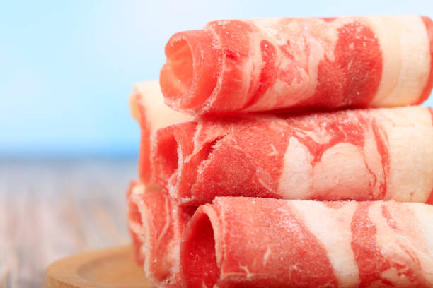 fresh mutton for hot pot, chinese food, Fresh mutton was rolled up on a plate Mutton rolls, fresh mutton for hot pot, chinese food, Fresh mutton was rolled up on a plate mutton roll for chinese hot pot stock pictures, royalty-free photos & images