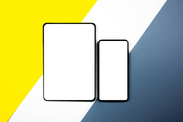 istock Mock up of a smartphone and a tablet on different colored backgrounds. 1302603298
