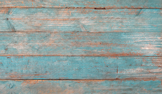 Grungy blue wooden boards with texture as background