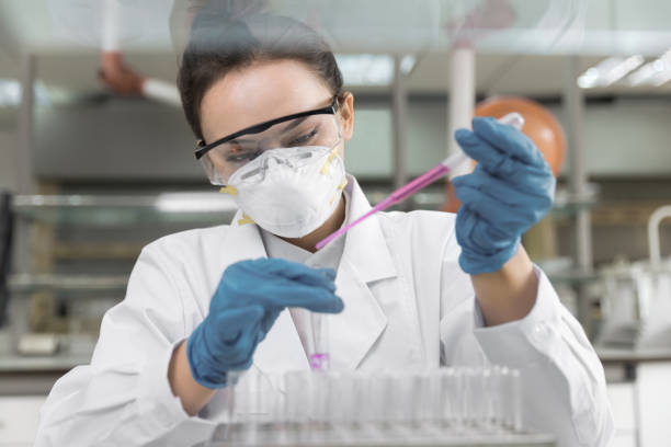 istock Female scientist working in the CDC laboratory. 1302604287