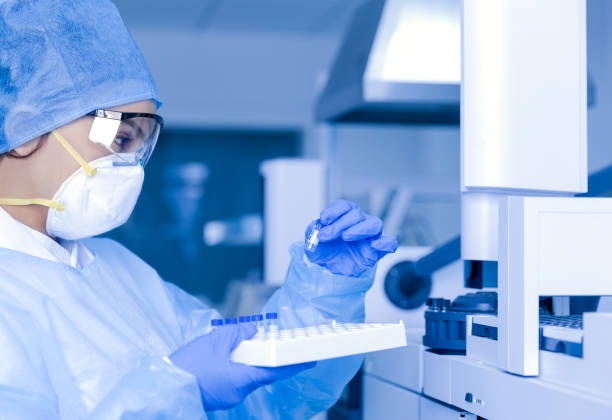istock Female scientist looking at the medical samples in the laboratory. 1302604354