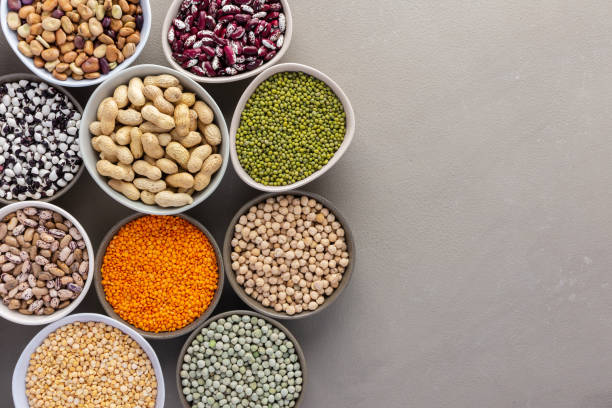 istock Different types of legumes in bowls 1302605656
