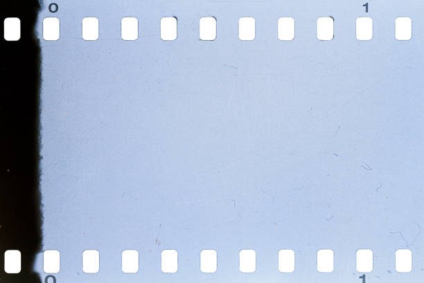 istock Dusty and grungy 35mm film texture or surface 1302605748
