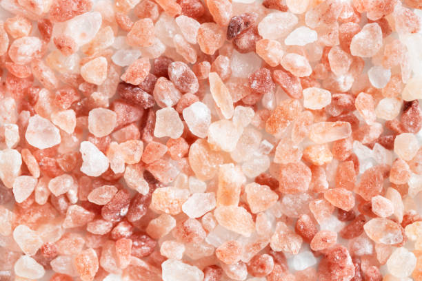 istock Background with Himalayan pink salt. 1302607078